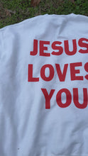 Load and play video in Gallery viewer, We Love Because He First Loved Us 1 John 4:19 Sweatshirt
